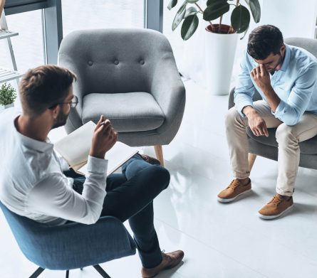 Totally despaired. Top view of young frustrated man solving his | Healnex