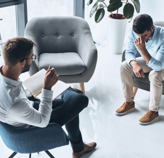 Totally despaired. Top view of young frustrated man solving his | Healnex